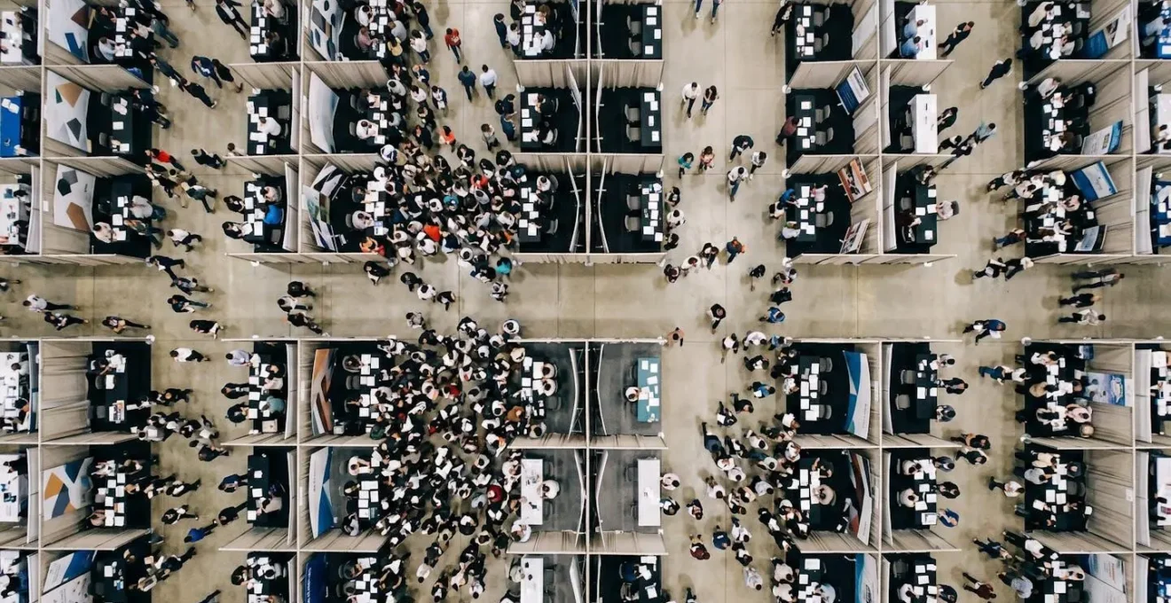 Aerial view of career fair floor showing strategic movement patterns